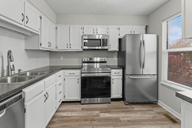 Photo - Broad Ripple townhome with garage, updated kitchen, and walkable convenience!