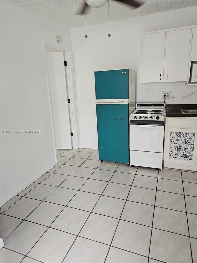 Photo - 18701 NW 52nd Ave Apartment Unit side