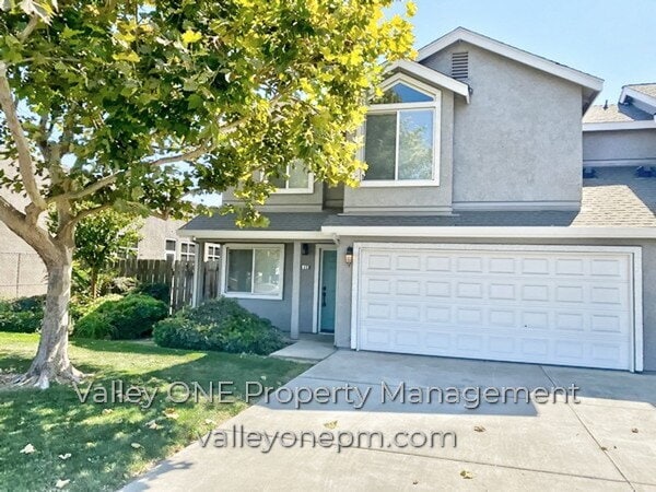 COMING SOON! Private Ground Floor Townhome in Desirable Complex with Attached 2 Car Garage