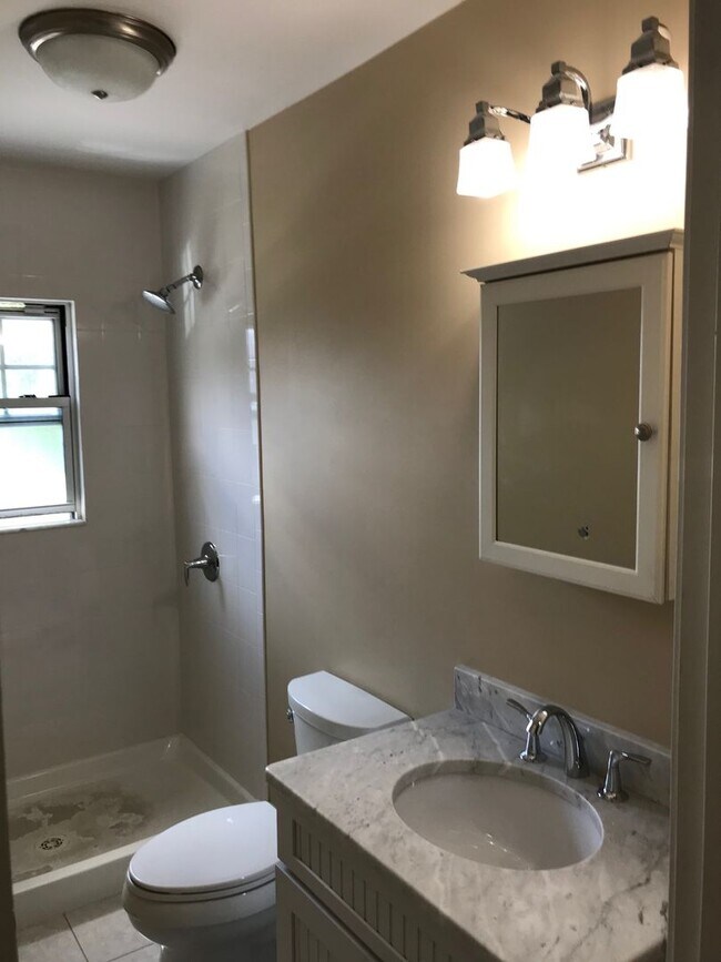 Photo - NO FEE LUXURY DUPLEX near T w 2 FREE Parking spaces and NO BROKER FEE.  Laundry in Unit, Central ...