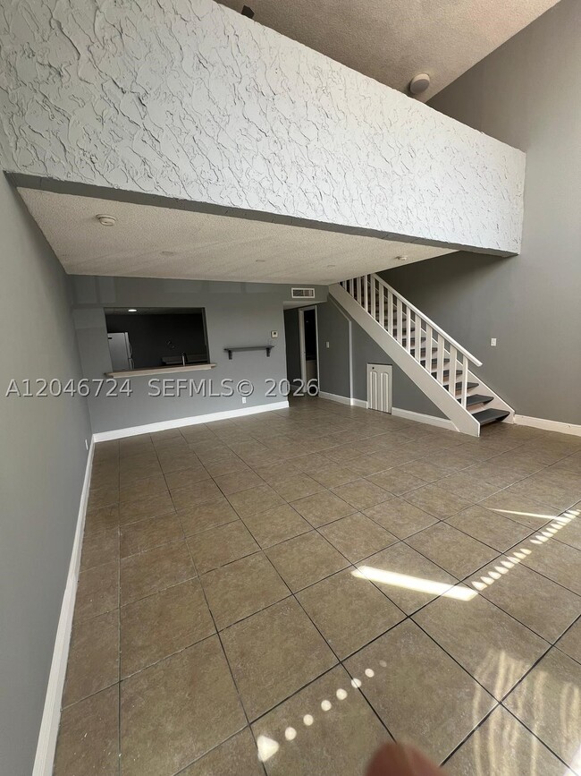 Building Photo - 18051 NW 68th Ave Unit K-204