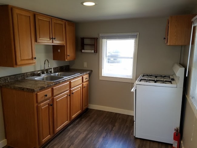Kitchen includes stove - 103 12th W St Unit 3