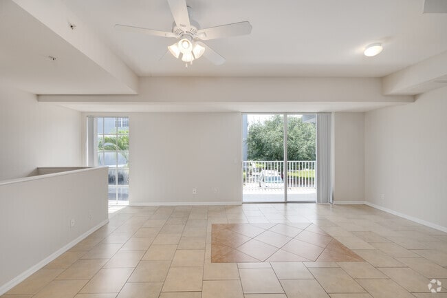2BR, 2.5BA - Living Room - Cobblestone on The Lake Apartments
