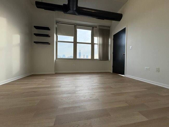 City Views from the primary bedroom - 6 S Laflin St Unit 507L