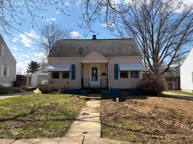 Building Photo - Bright Cape w/ Sunroom, Central Air, Big Basement & Backyard Shed