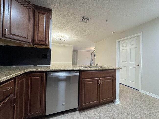 Photo - Oviedo 2/2 Condo with Tile & LVP Flooring, Updated Baths, New Paint & Appliances! Unit 104