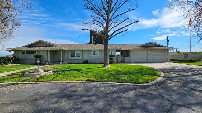 Building Photo - 7686 S Temperance Ave