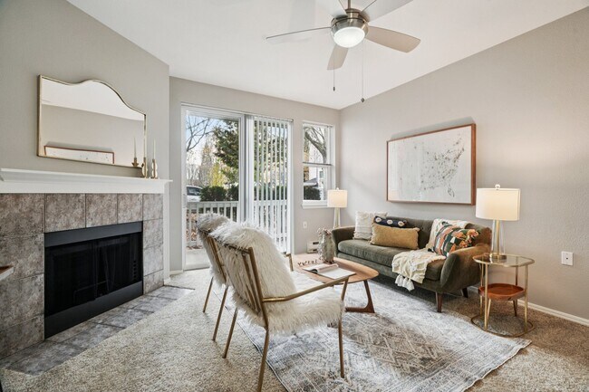 Palladia - A living room with a fireplace