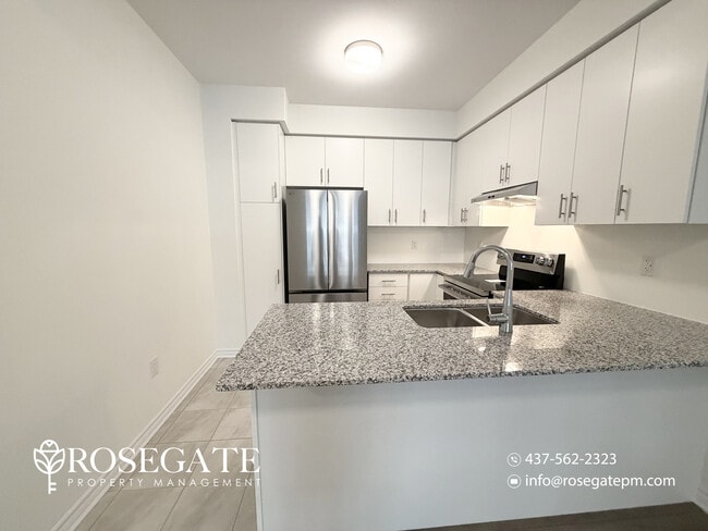 Photo - Spacious 3-Floor Freehold Townhome with Garage, Private Balcony & Backyard – Brampton