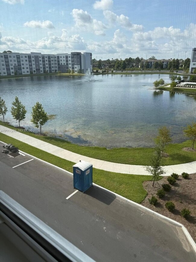 Building Photo - 5563 Millennia Park Dr Unit 307