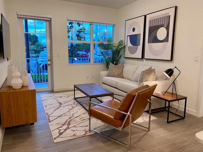 "Penta" - Living Room - Taupe Model - Aviara Green Apartments