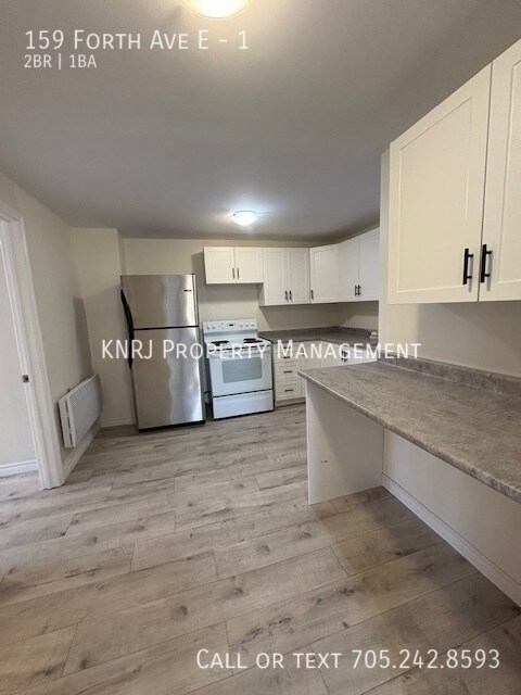 Photo - Two Bedroom Main Floor Apartment Unité 1