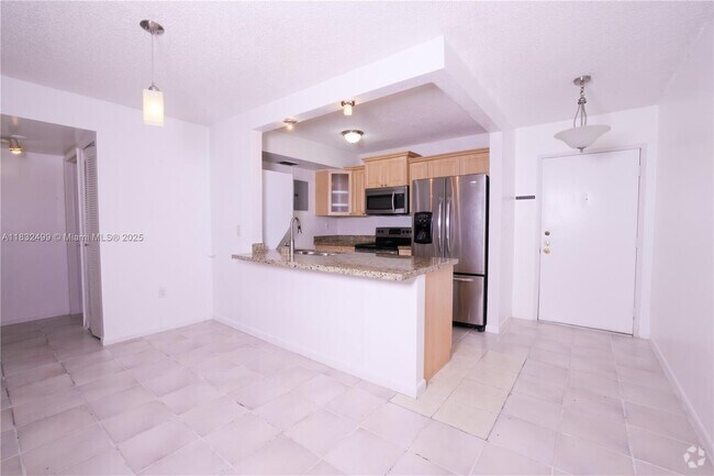 Building Photo - 8873 Fontainebleau Blvd Unit 207B Rental