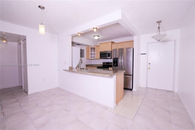 Building Photo - 8873 Fontainebleau Blvd Unit 207B Rental