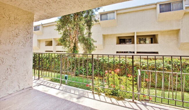 View the courtyard off your private balcony