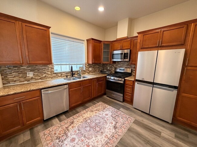 Photo - Modern 3 Bed, 3 Bath Home with New Appliances, A/C, 2 Car Garage, Patio, and Balcony