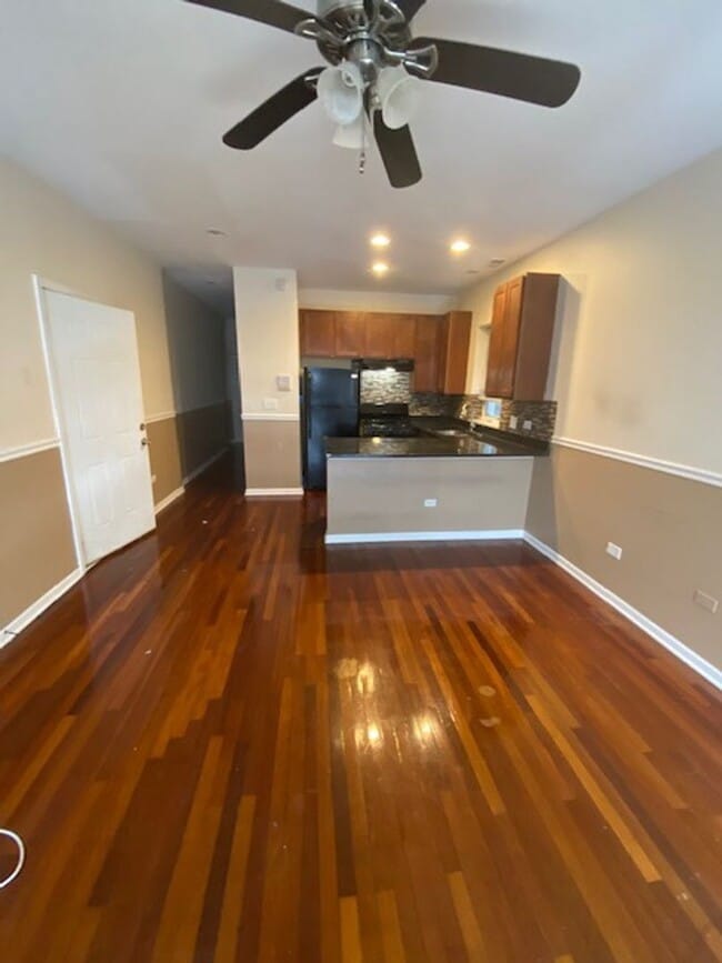 Photo - 7654 S Colfax Ave Unidad 2