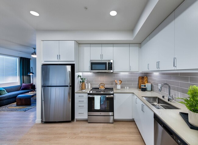 Quartz Countertops & Tile Backsplashes - Adler