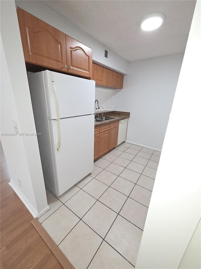 Building Photo - 8886 SW 3rd St Unit 204