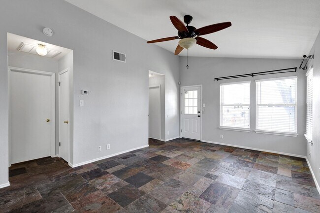 Photo - Carpet-Free Home with High Ceilings & Outdoor Retreat