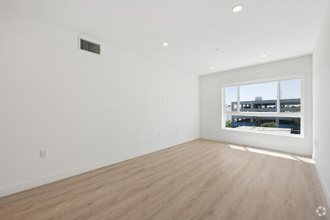 Eagle - 4BR, 4BA - 1510SF - Living Room - Tamarind Sunset