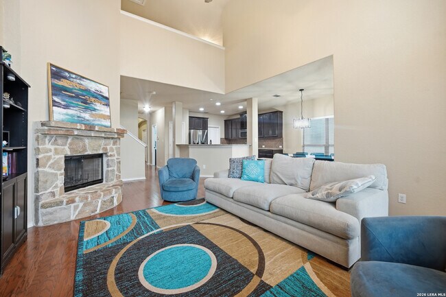 Expansive 6-Bedroom Home with Fireplace, Hardwood Floors & Fenced Yard in Cibolo