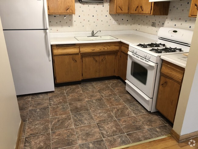Building Photo - 6019 W Higgins Ave Unit 1-B Rental