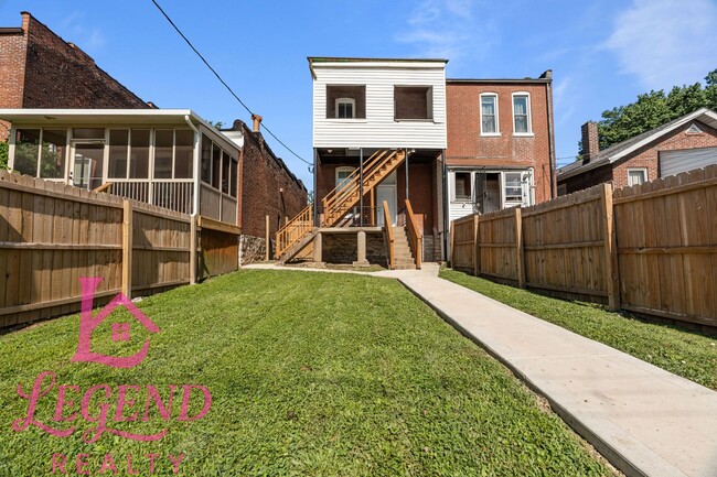 Photo - Completely Renovated 4BR Brick Home with 3 Full Baths & Off-Street Parking