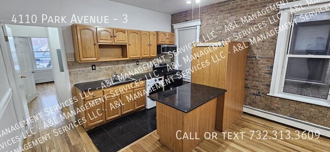 Building Photo - 4110 Park Ave Unit 3