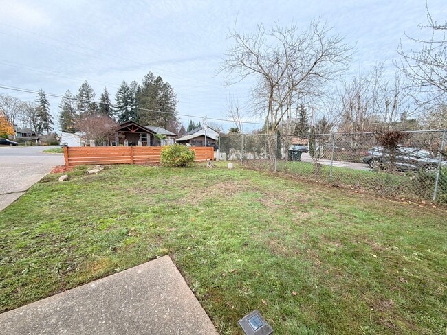 Photo - Comfortable Beaverton Home with AC, Fireplace, Large Fenced Yard, Spacious Garage and W/D!
