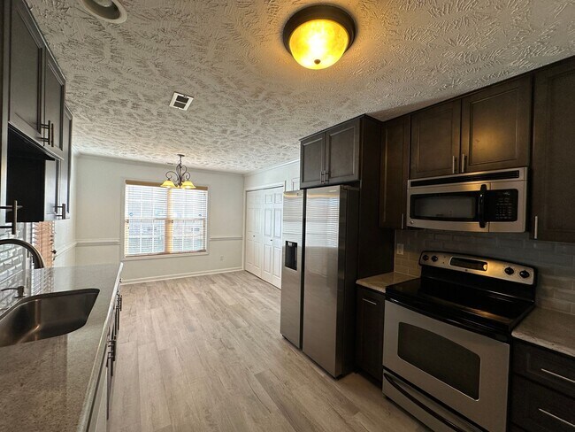 Photo - Well-Maintained 4 Bed 2.5 Bath with Fenced Backyard