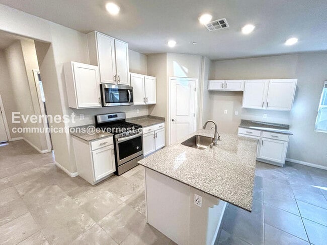 Photo - 3 Bed, 2 Bath Home with Fenced Yard & Garage / Available Now!