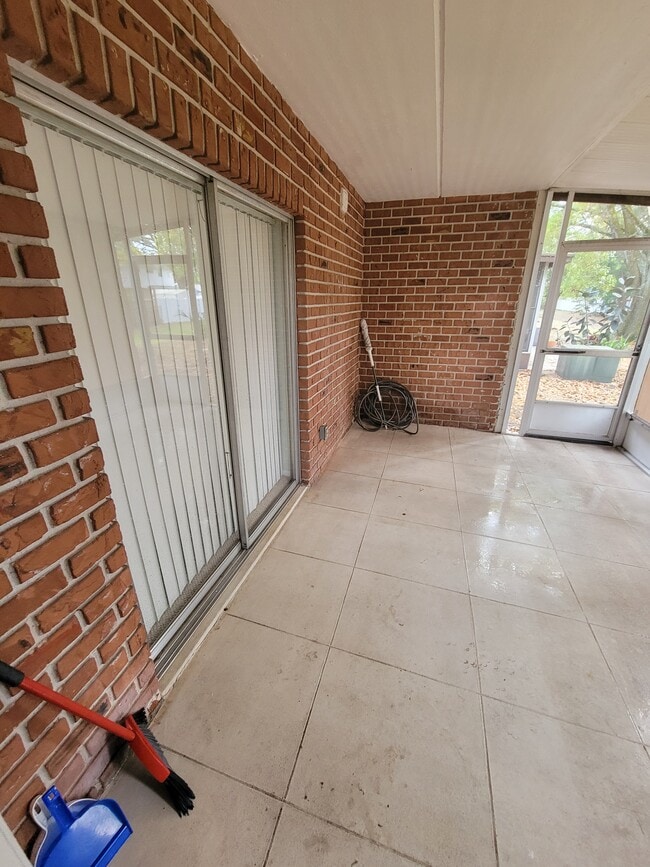 Building Photo - 1335 85th Ter N Unit A