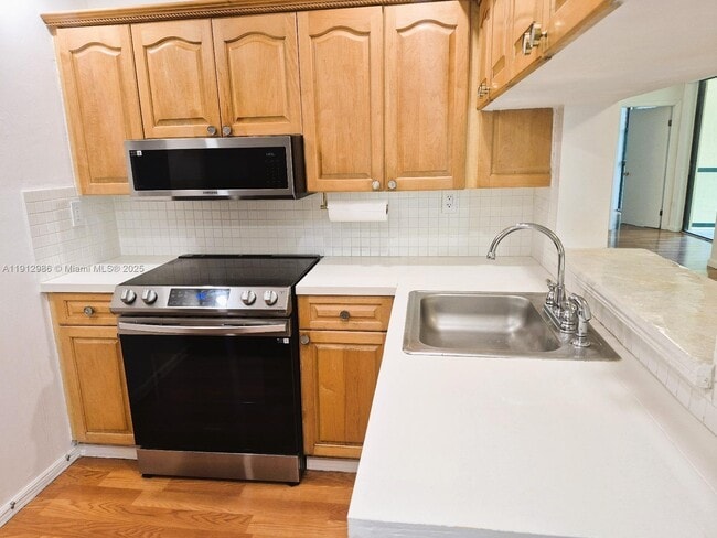 Building Photo - 11800 SW 18th St Unit 209-4