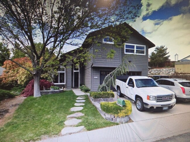 Building Photo - Northwest Reno Living: Spacious 4-Bedroom Home with Garage