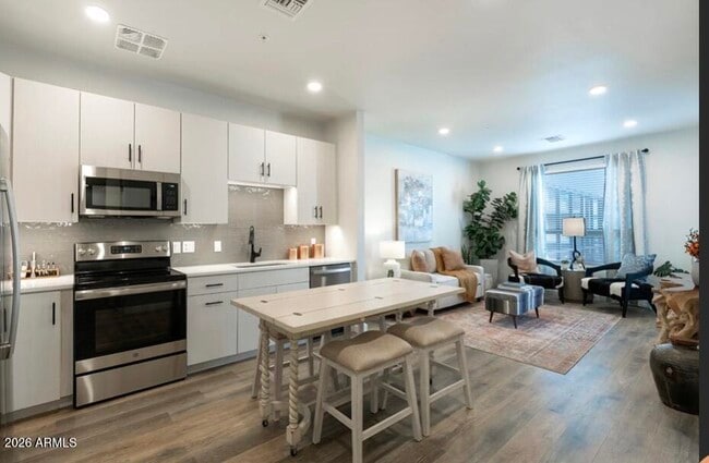 Building Photo - 9449 N 90th St Unit A1