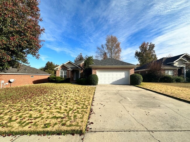 Photo - 4 bed 2 bath home with 2 car garage, covered patio, and fenced backyard