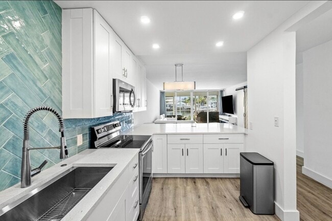 Photo - 698 NE Spanish River Blvd Unit 14