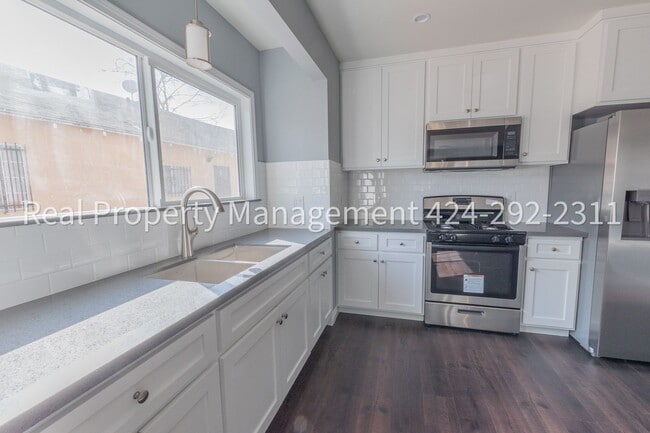 Building Photo - 1352 E 23rd St Unit 1354 E 23rd Street -