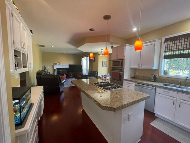 Photo - Spacious 4-Bedroom Home with Gourmet Kitchen, Primary Suite & Backyard Garden in Bethany
