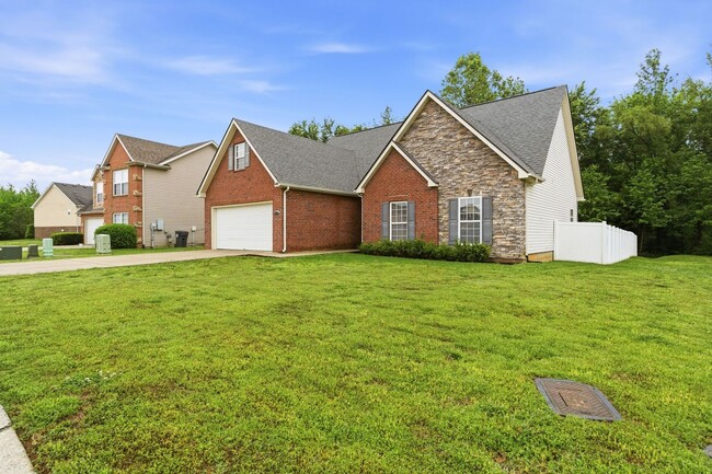 Building Photo - Charming Brick Home with Open Layout & Spacious Backyard in Pleasant View