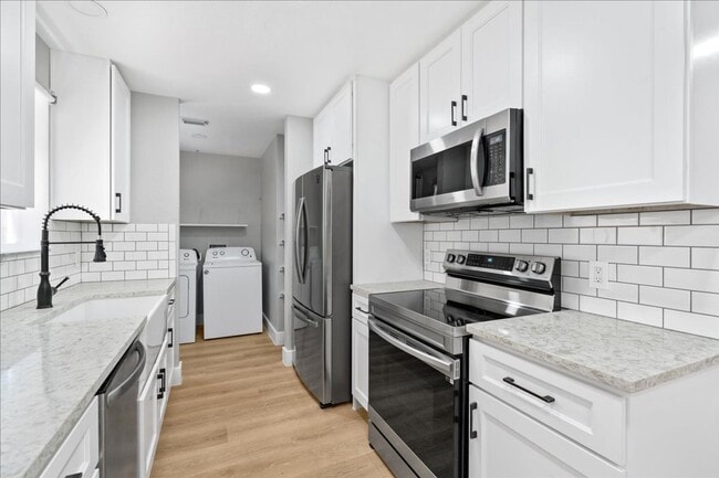 Building Photo - 3107 E 13th St Unit A Rental
