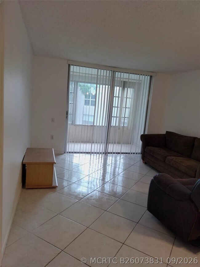 Building Photo - 9351 Lime Bay Blvd Unit 302