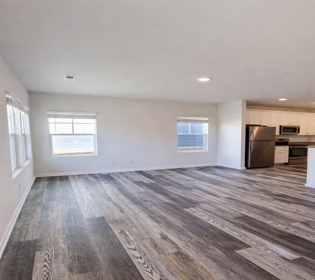 Photo - COMING SOON: 3BR Townhome • Full Kitchen • Garage + Driveway