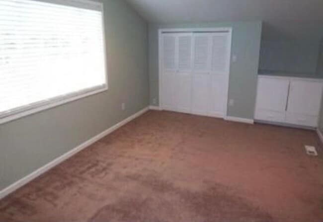 Photo - Spacious & light filled home with a garage, backyard, storage & hardwood floors throughout
