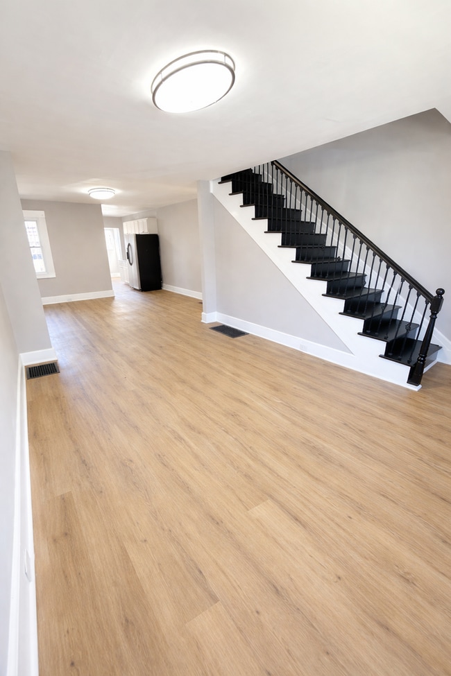 Photo - Beautifully Modern 3BR Townhome | Finished Basement | Fenced Yard | Baltimore