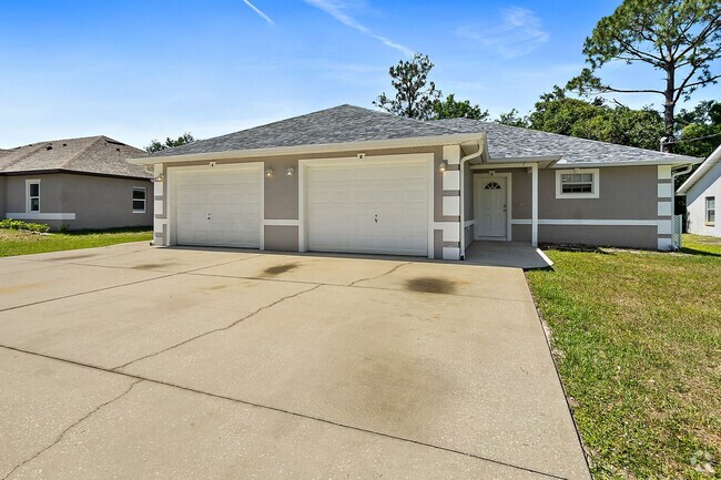 Building Photo - Spacious 3 Bedroom 2 Bath Duplex in Pine G... Rental
