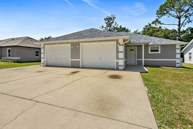 Building Photo - Spacious 3 Bedroom 2 Bath Duplex in Pine G... Rental