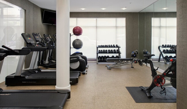 24-hour fitness center equipped with strength training and cardio equipment