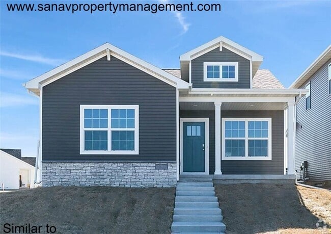 Building Photo - "Charming 2-Bedroom Home in Exclusive 36 W...